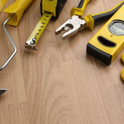 high-view-yellow-repair-tools-wooden-background